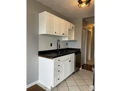 Interior photo 1 of #11 11219 103A AV NW