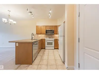 Interior photo 3 of #110 1406 HODGSON WY NW