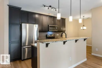 Interior photo 2 of #206 6083 MAYNARD WY NW