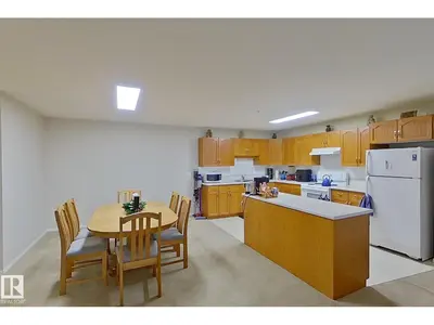 Interior photo 1 of #208 10421 42 AV NW