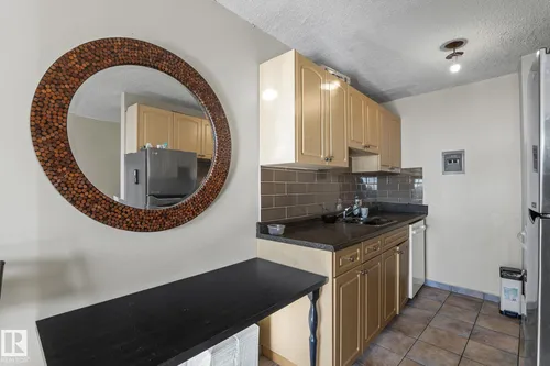 # 2004 10883 SASKATCHEWAN DR. NW, Edmonton - $150,000