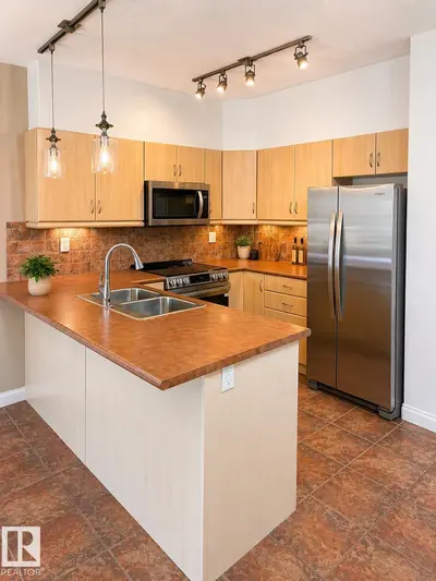 Interior photo 4 of #310 1406 HODGSON WY NW