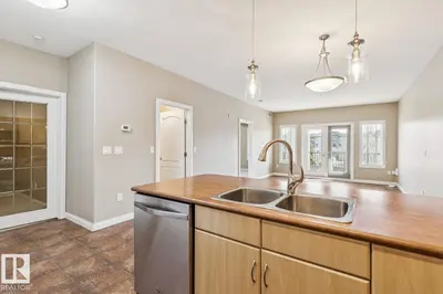 Interior photo 3 of #310 1406 HODGSON WY NW