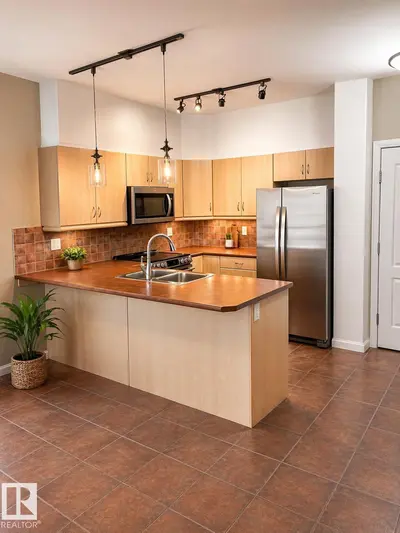 Interior photo 1 of #310 1406 HODGSON WY NW