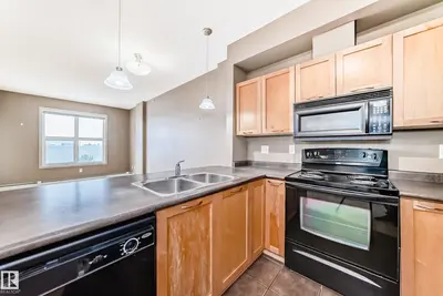 Interior photo 1 of #1-304 4245 139 AV NW