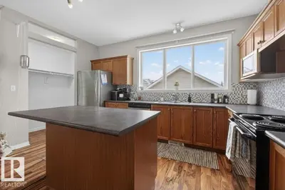 Interior photo 2 of 7704 16 AV SW