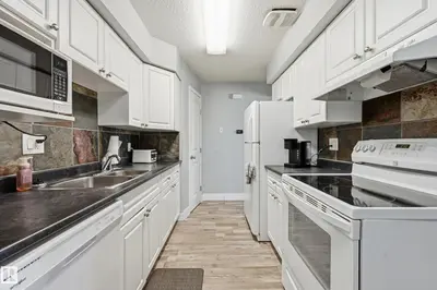 Interior photo 2 of #9 8020 141 AV NW