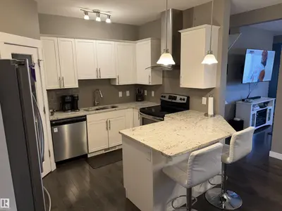 Interior photo 1 of 7028 174 AV NW