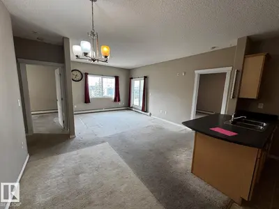 Interior photo 1 of #300 16715 100 AV NW