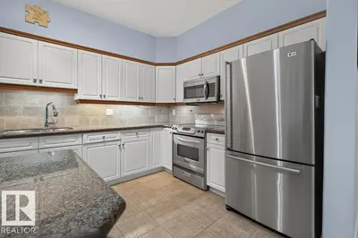 Interior photo 4 of #106 1406 HODGSON WY NW