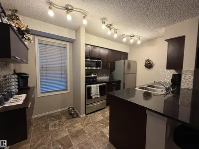 Interior photo 3 of #114 1080 MCCONACHIE BV NW