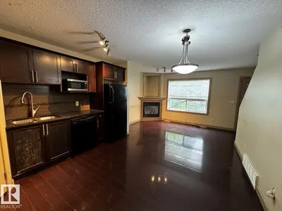 Interior photo 1 of #6 1820 34 AV NW