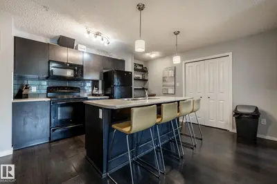 Interior photo 4 of #102 508 ALBANY WY NW NW