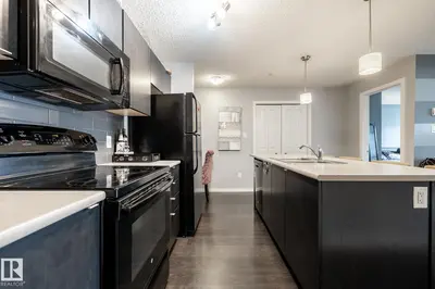 Interior photo 3 of #102 508 ALBANY WY NW NW