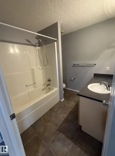 Interior photo 3 of #7 8304 11 AV SW