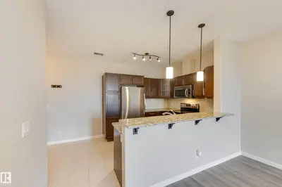 Interior photo 2 of #317 6083 MAYNARD WY NW