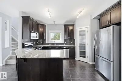 Photo 2 of 7043 22 AV SW