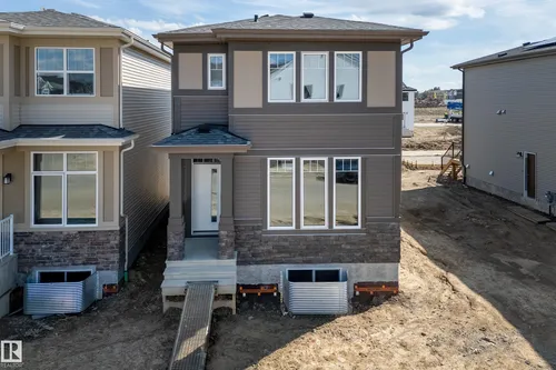 21011 25 AV NW