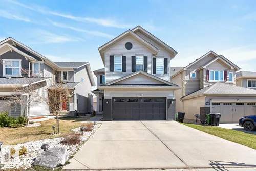 7942 ERASMUS CR NW