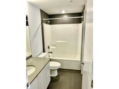 #203 8510 90 ST NW