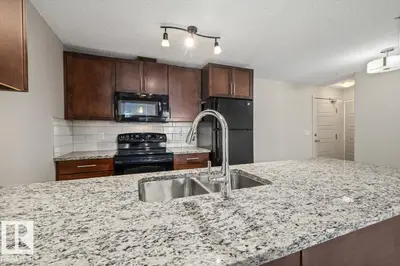 Photo 1 of #230 6076 SCHONSEE WY NW