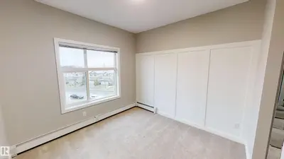 Photo 3 of #404 5510 Schonsee DR NW